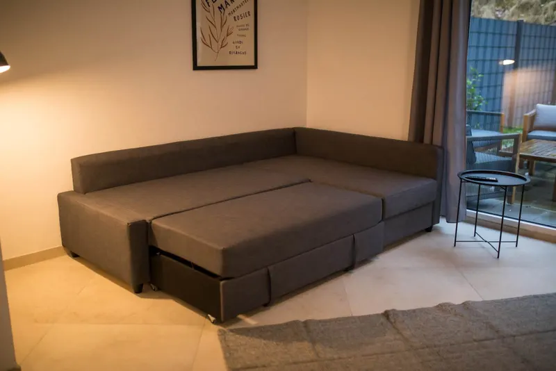 Ecksofa als Schlafsofa ausgezogen
